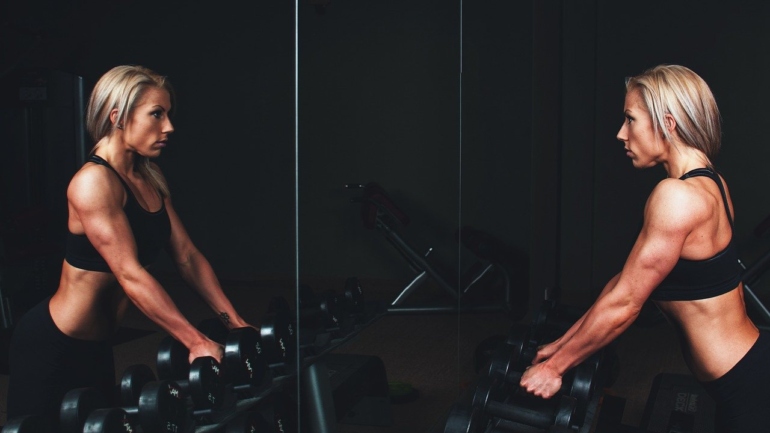 exercising in front of a mirror